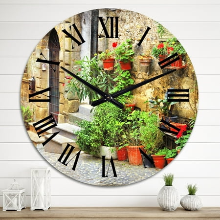 DESIGN ART Designart 'Charming Old Streets In Mediterranean Village' Colonial wall clock 36 In. Wide x 36 In. High