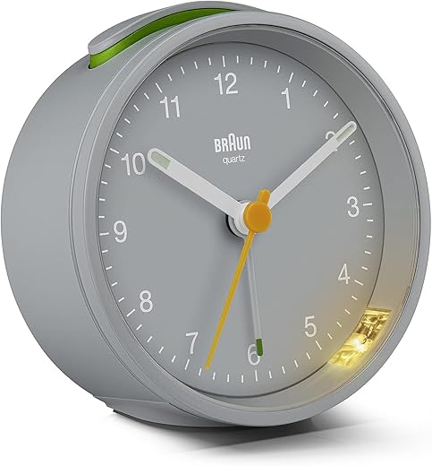 Braun Classic Analogue Alarm Clock with Snooze and Light, Quiet Quartz Movement, Crescendo Beep Alarm in Grey, model BC12G.