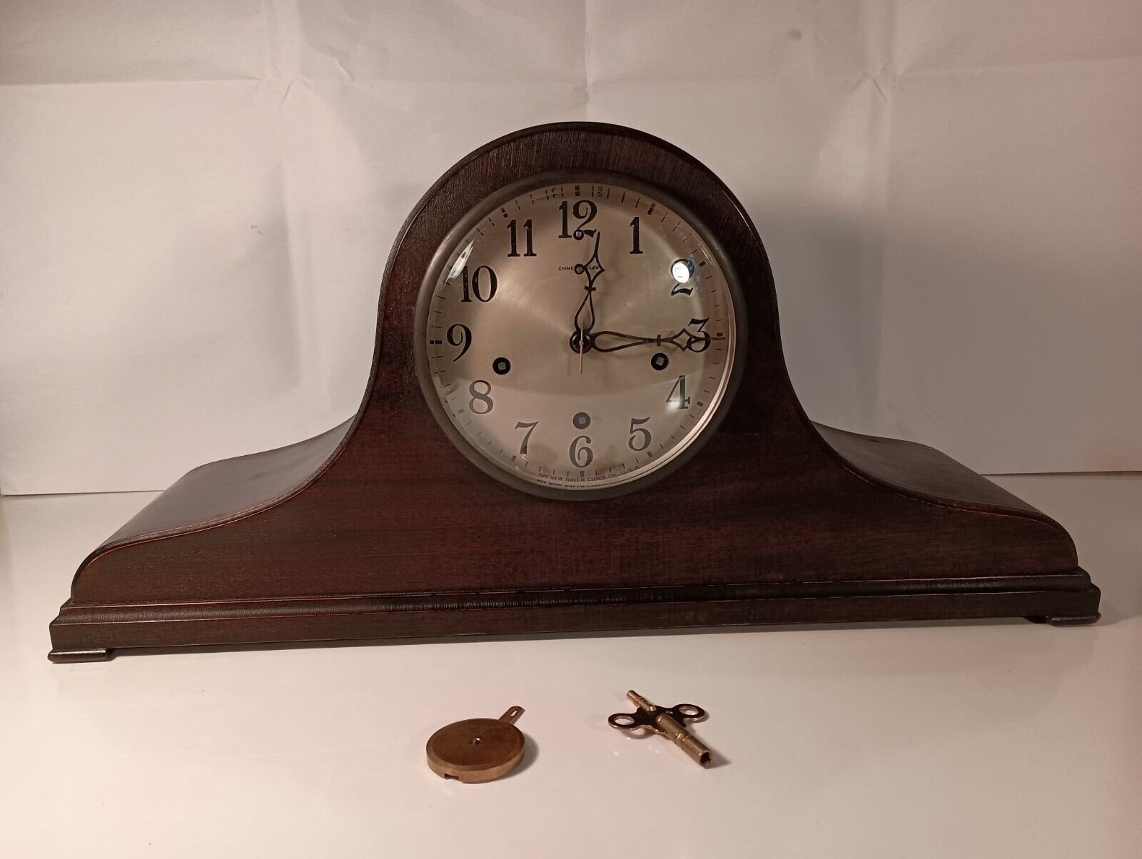 antique key wind 8 day New Haven mantel clock with Westminster Chimes