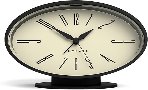 NEWGATE® ‘Ronnie’ retro oval alarm clock in black soft touch silicone finish, and silent sweep movement with digital beep alarm sound. Ideal for bedside, desks and mantels.