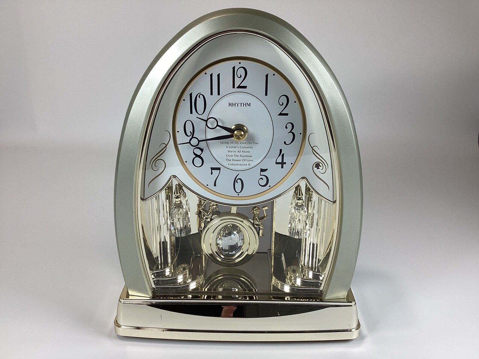 Rhythm’s “DWS Crystal Bells” musical mantel clock,plays 6 melodies.