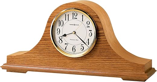 Howard Miller Nicholas Mantel Clock 635-100 ? Golden Oak Finish, Polished Brass-Finish Bezel, Black Numerals, Brass Second Hand, Quartz Movement, Westminster Chime