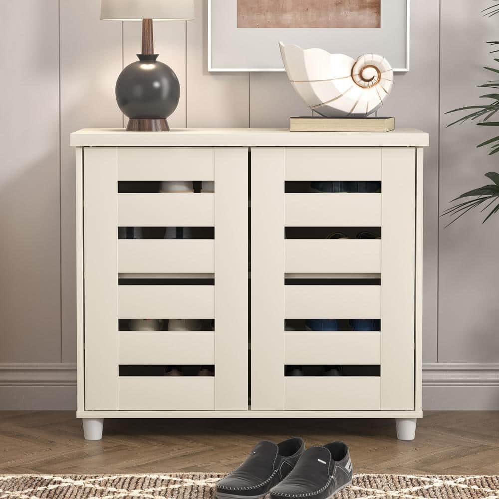 27.3 in. H x 30.7 in. W Ivory Wood Shoe Storage Cabinet...