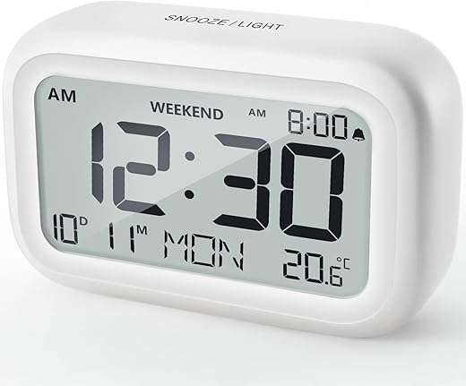 DOOMAY Digital Alarm Clock Bedside - Battery Powered Clock with LCD Display Volume Adjustable Snooze and Weekend Mode for Bedroom Office Desk Travel