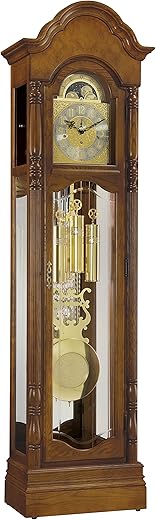 Howard Miller Ridgeway Primrose Floor Clock 2582 – Treasure Oak Finish, Vertical Home Décor, Illuminated Dial, Lyre Pendulum, Cable-Driven Triple-Chime Movement