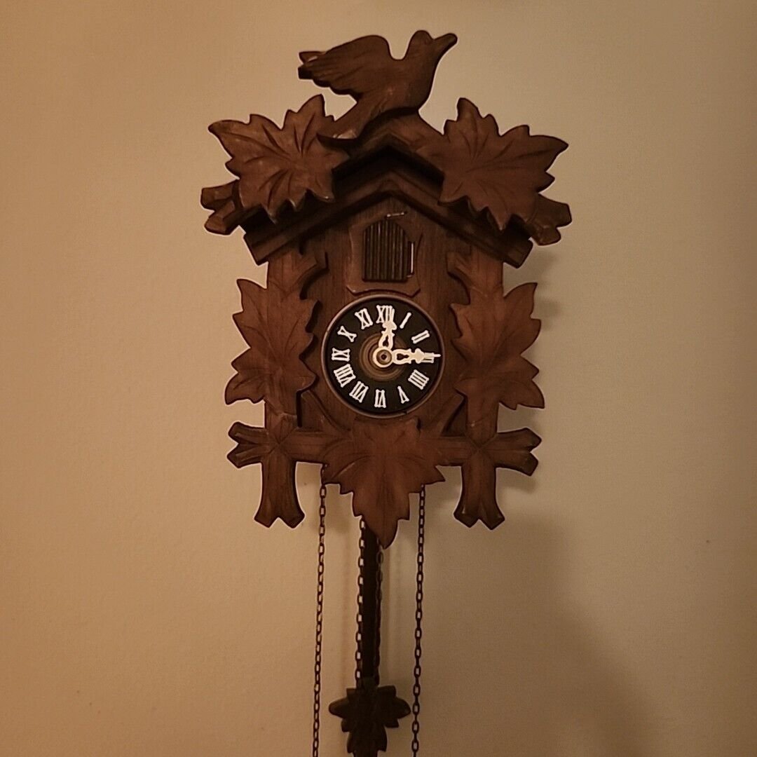 River City Cuckoo clock w/pendulum, weights, chains, manual, one day wall clock