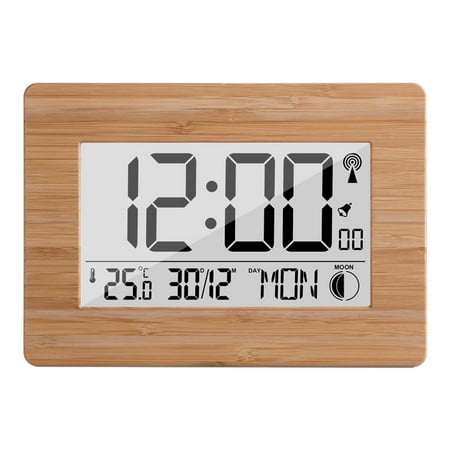 Radio controlled digital clock with DCF time signal, housing with real bamboo, LCD display, thermometer, alarm clock and calendar. Battery included