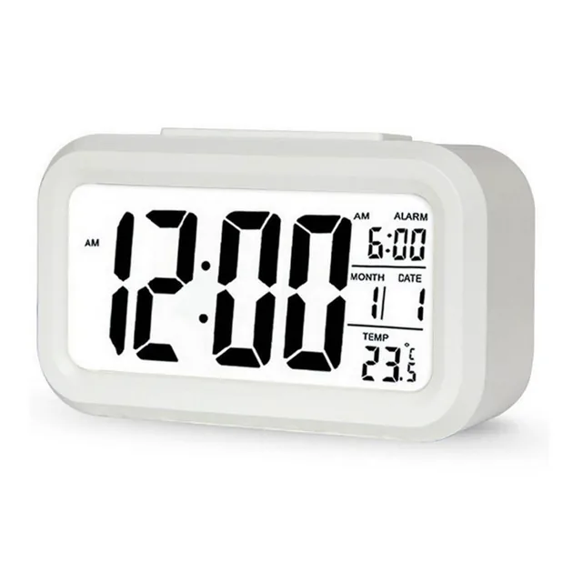 White digital desk clock with LCD display White digital desk clock with LCD display - check offer